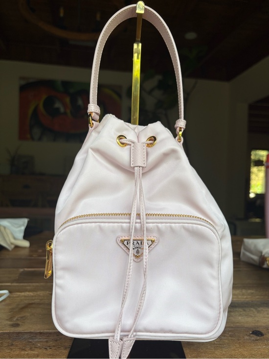 Prada Handbags - Prada Pale Pink Nylon Drawstring Mini Backpack with Gold Hardware